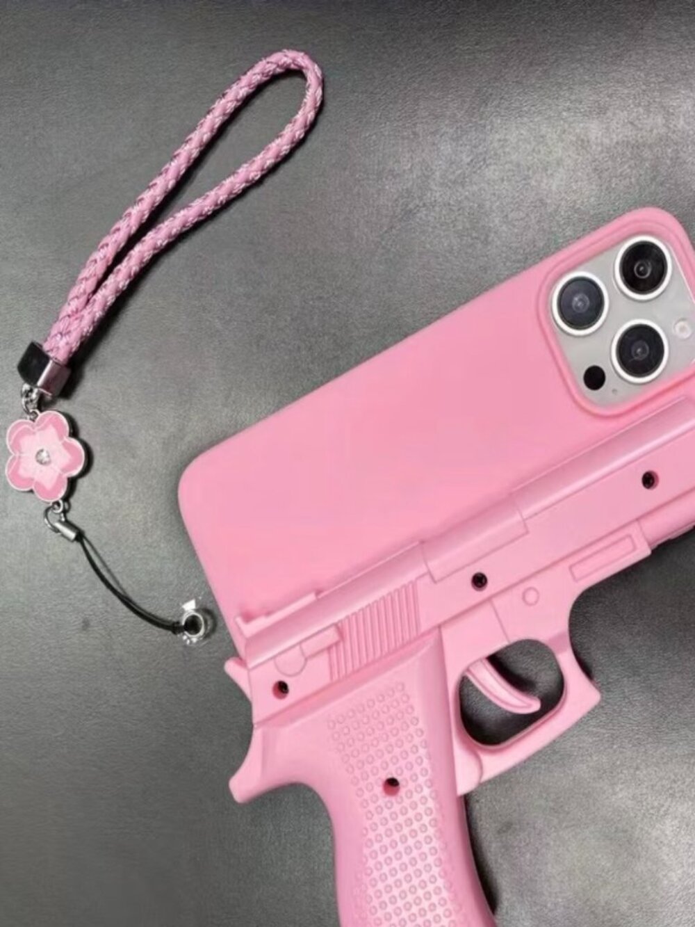 BRAND NEW Pink gun shaped novelty silicone phone care w Foral charm NWOT
